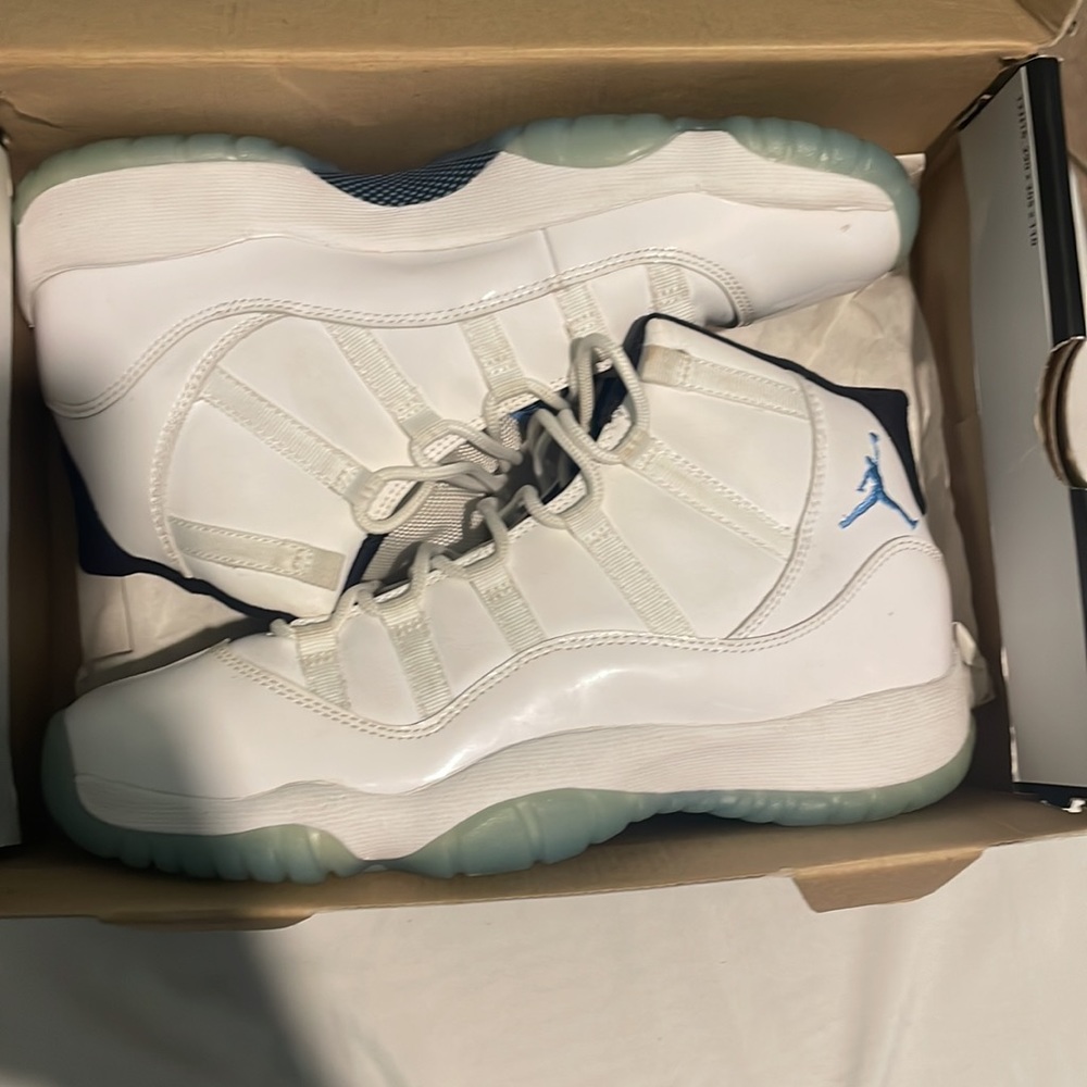 Kids baby blue and white Jordan’s